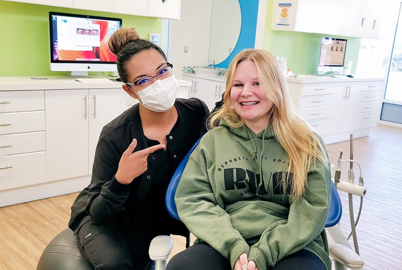 A patient and a certified dental assistant meet during a consultation